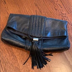Romy Gold clutch - black leather w tassel & duster